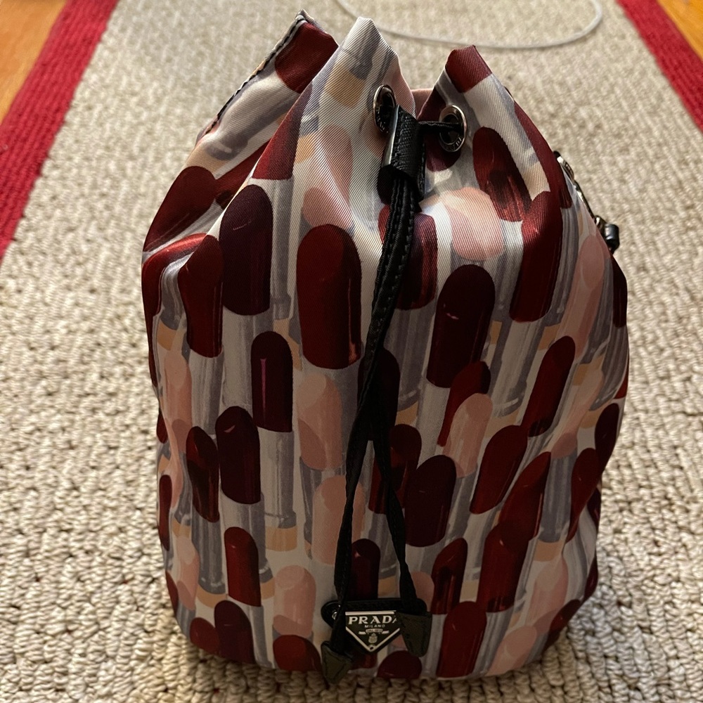 Prada bucket bag.